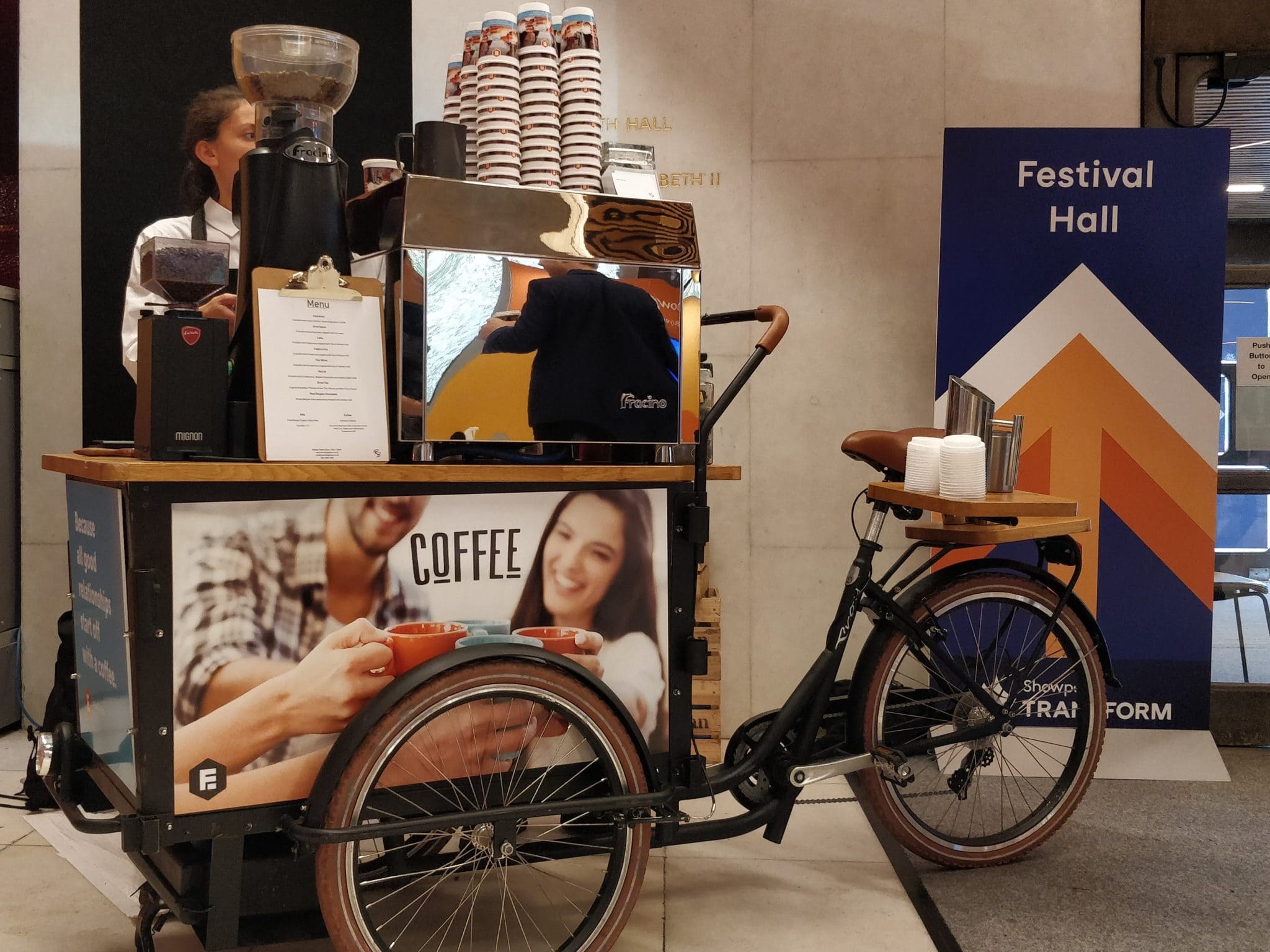 Wooden coffee bike at festival hall event